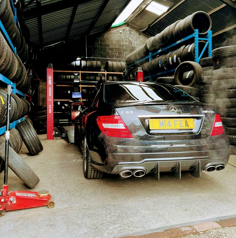 Fast Fit Tyres signage and forecourt in Oswaldtwistle